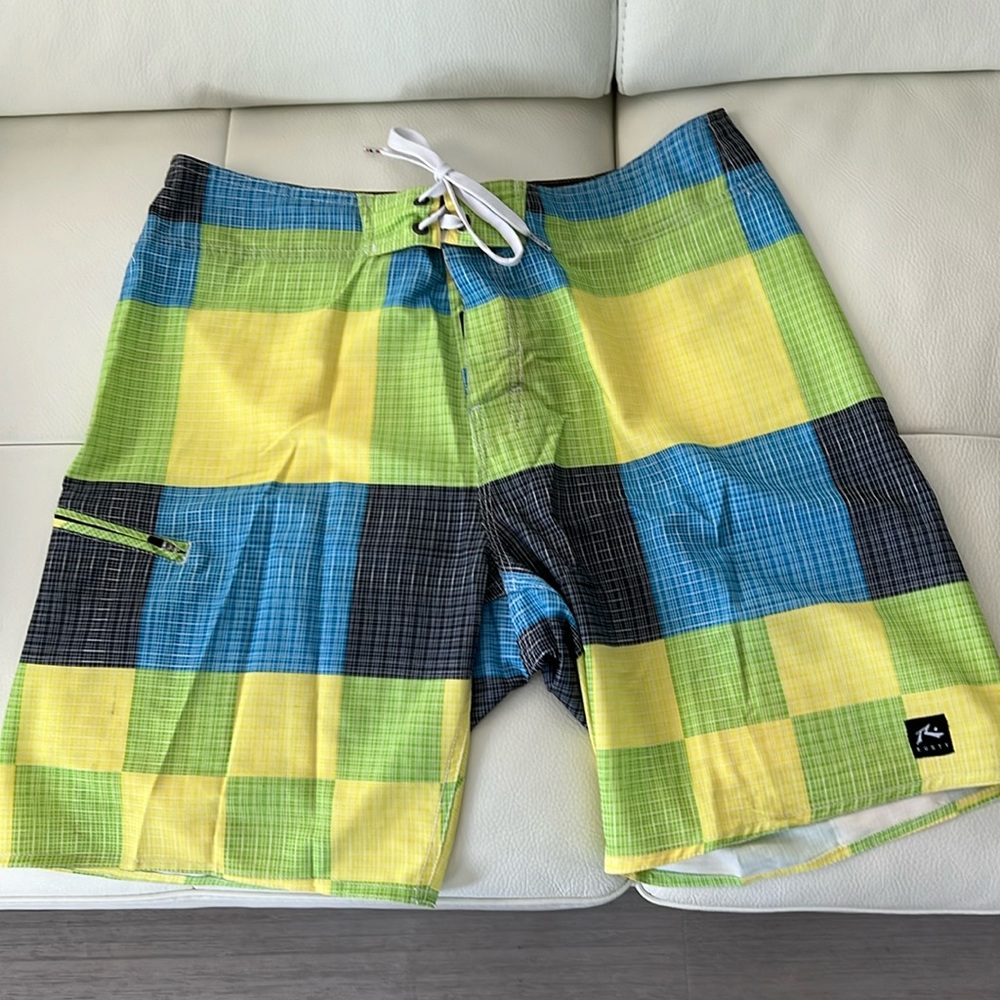 Rusty board shorts Sz 33, multi color block pattern, GUC, drawstring closure